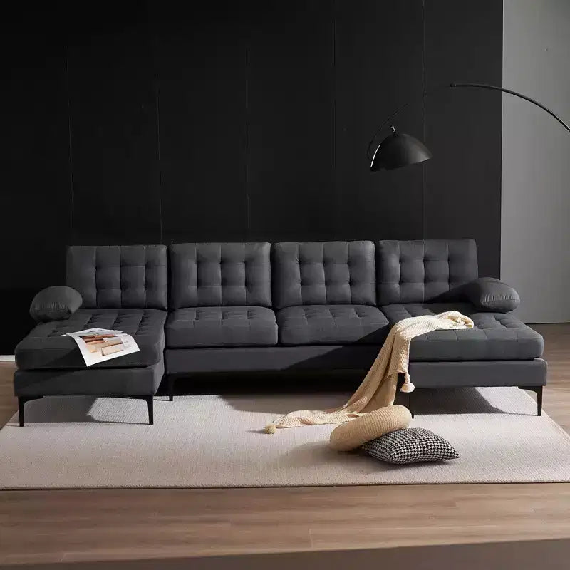 Canapé 4 places en U touffeté gris avec accoudoirs et surmatelas, largeur 110 po