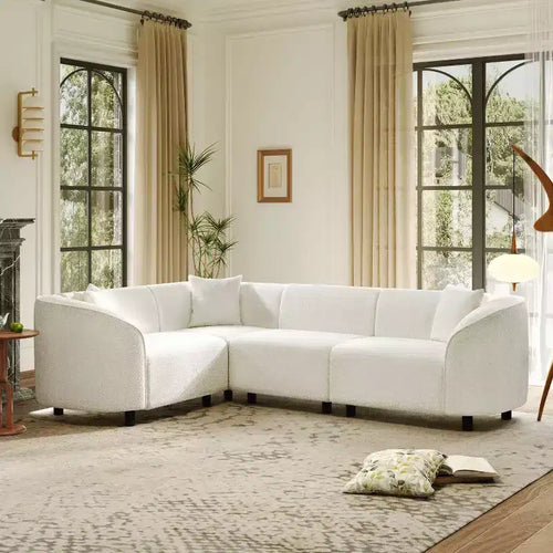 Canapé d'angle incurvé en U de 264 cm, avec revêtement bouclé de qualité supérieure et design sculptural de luxe à quatre places pour un salon spacieux.